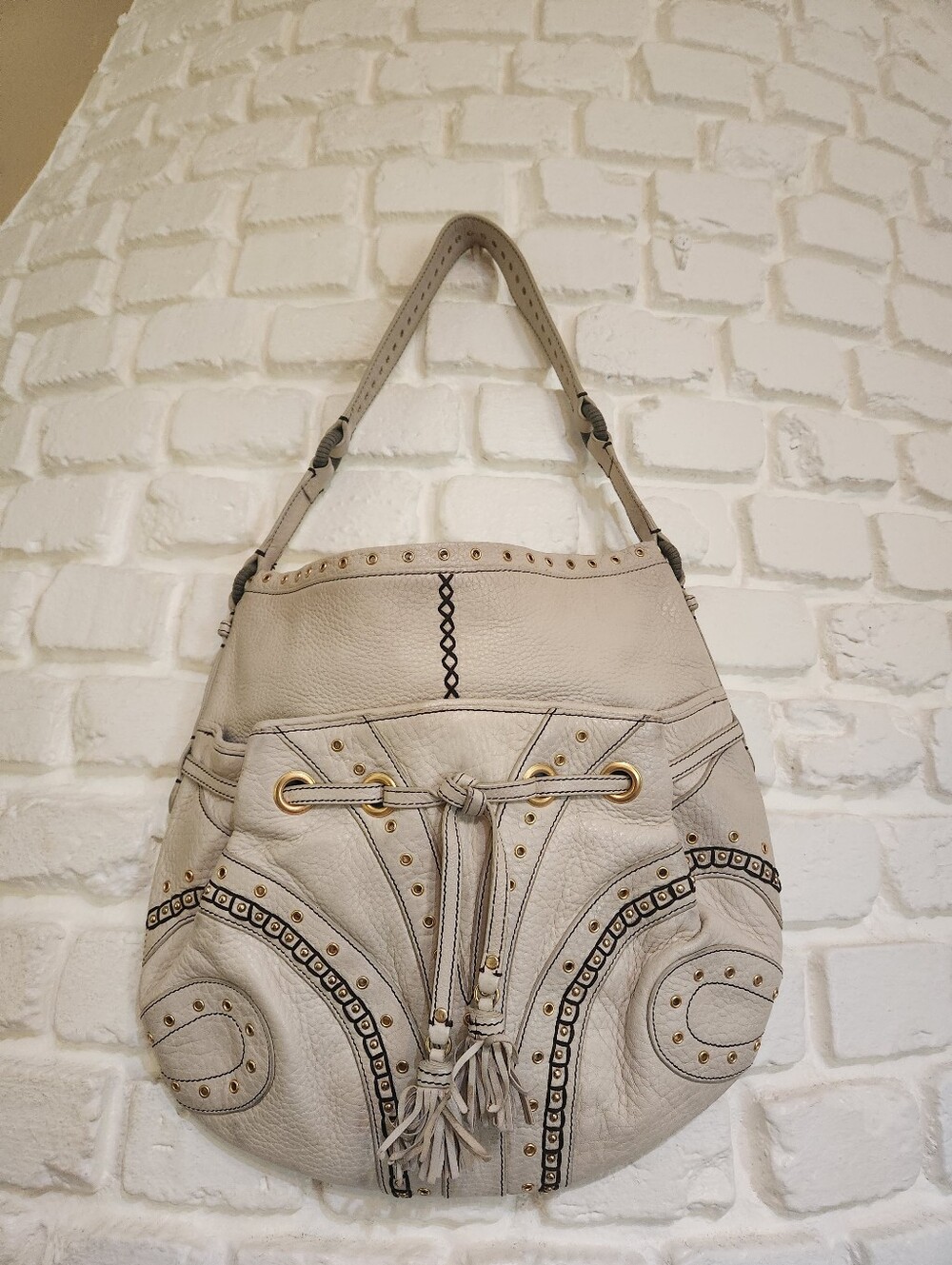 Cole Haan Cream Studded Drawstring Hobo Bag Whipstitch Detail